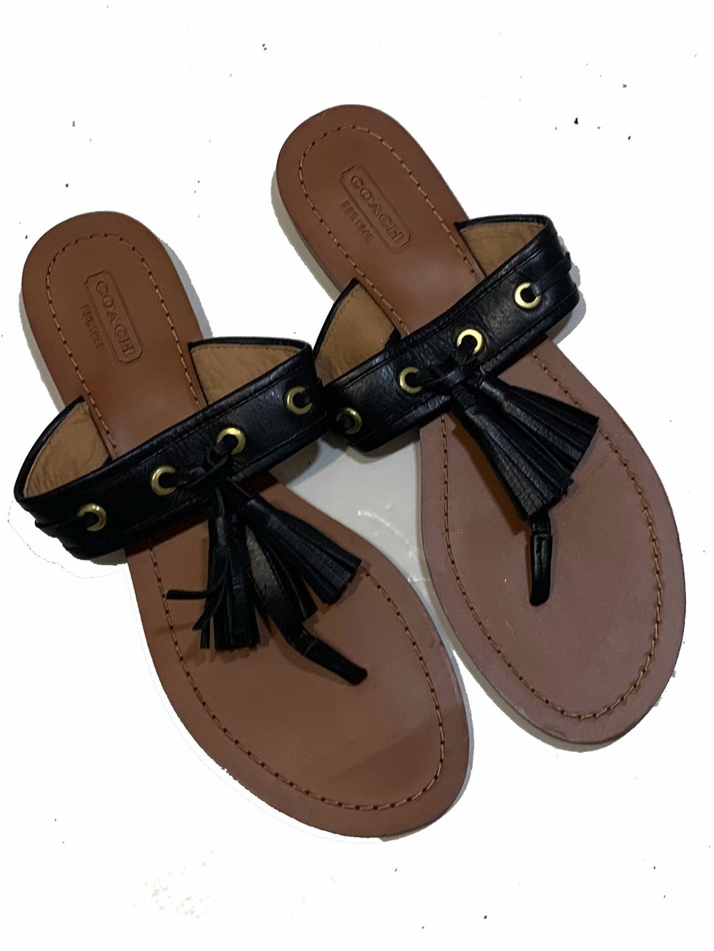 COACH Black Leather Tassel Thong Sandals with Gold Eyelets